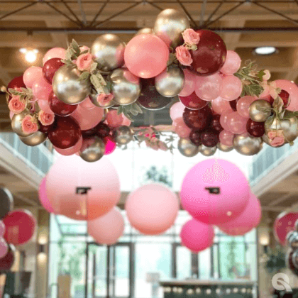 Silver, Pink, and Maroon Ceiling Balloon Decor