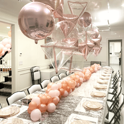 Pink helium balloon centerpiece and table runner