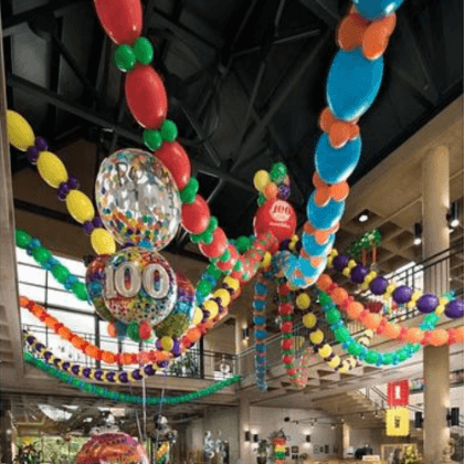 Colorful ceiling balloon decor inspo