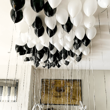 Black and white ceiling balloon decor