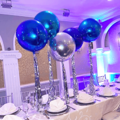 Blue and silver balloon with tassel centerpiece